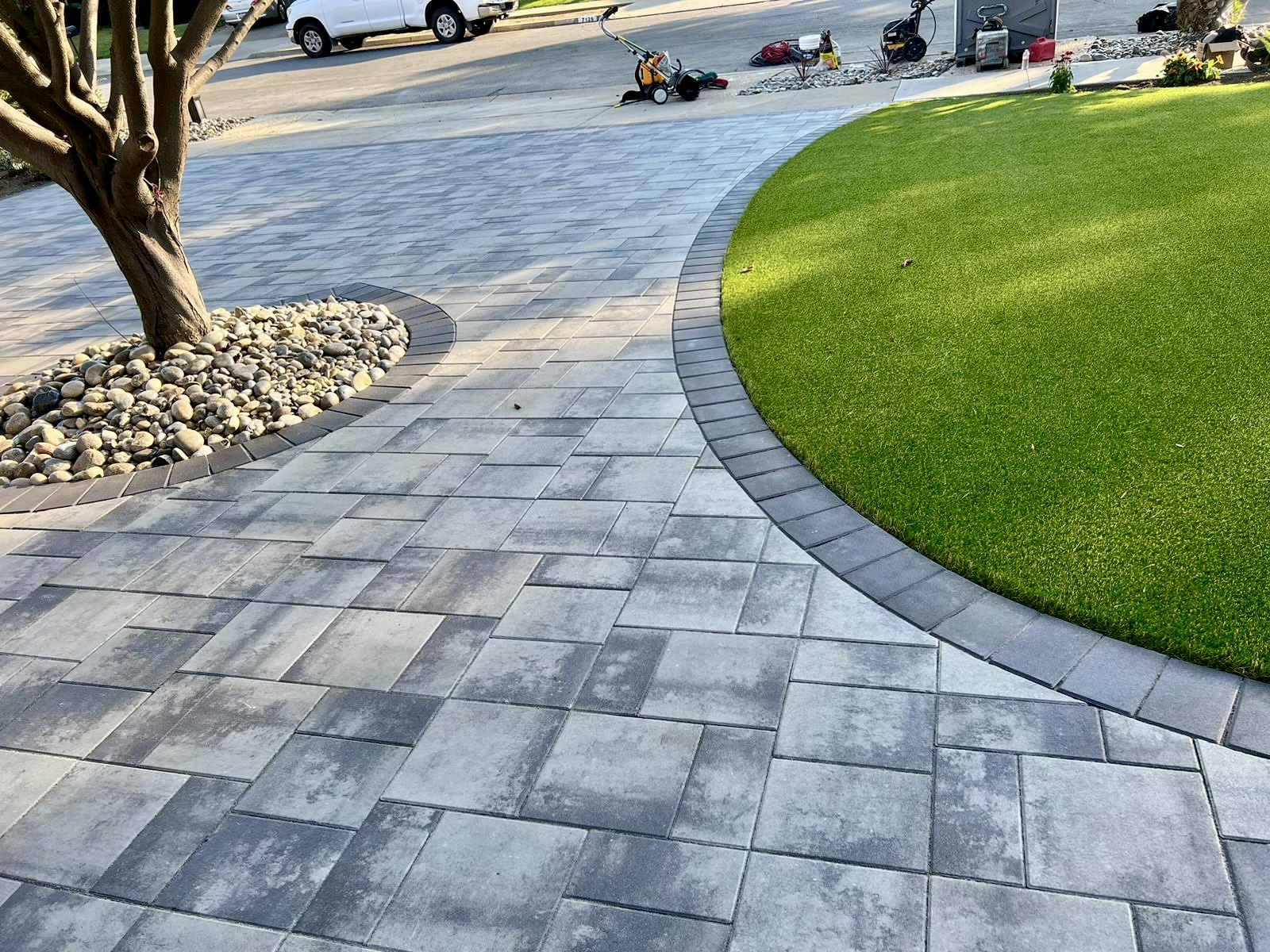 Curved paver walkway with precision borders